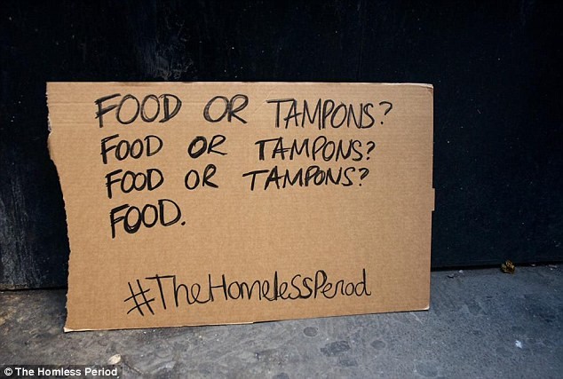 Cardboard signs from the Homeless Period campaign spell out the harsh realities for women
