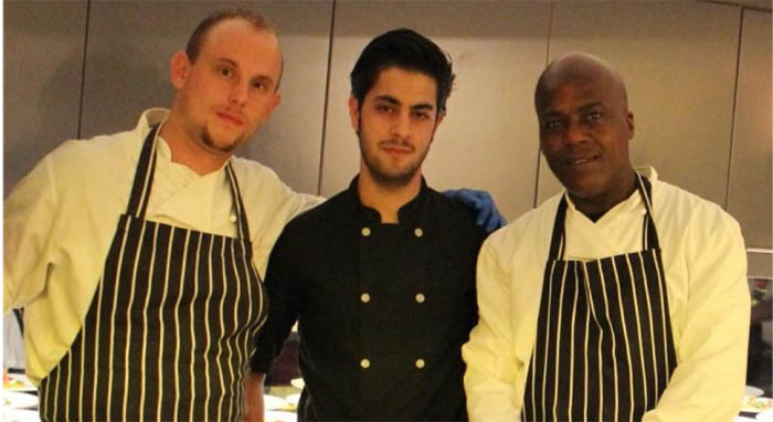 Chef, Antoine and trainees in the Providence Row kitchen. ©Jane Evans