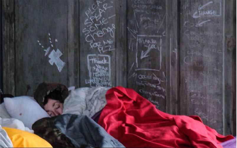 Destitute woman sleeping rough. ©Maureen Barl?in on Creative Commons