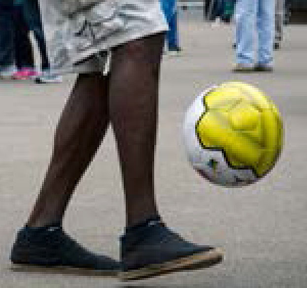 Player warms up for Homeless World cup © Lisa Boyd