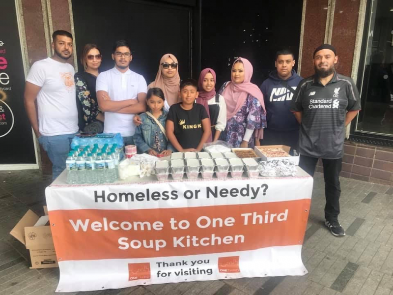 Emdad (first on right) with the One Third Soup Kitchen in east London.  © Emdad Rahman