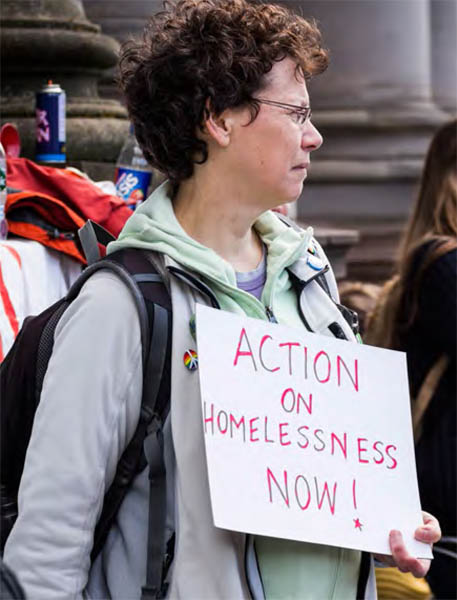 A protester in Glasgow calls for action on homelessness.  © Ilisa Stack for The Pavement