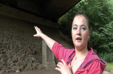 Sammy Wyatt points out the road bridge where she and her partner survived in sometimes freezing conditions.